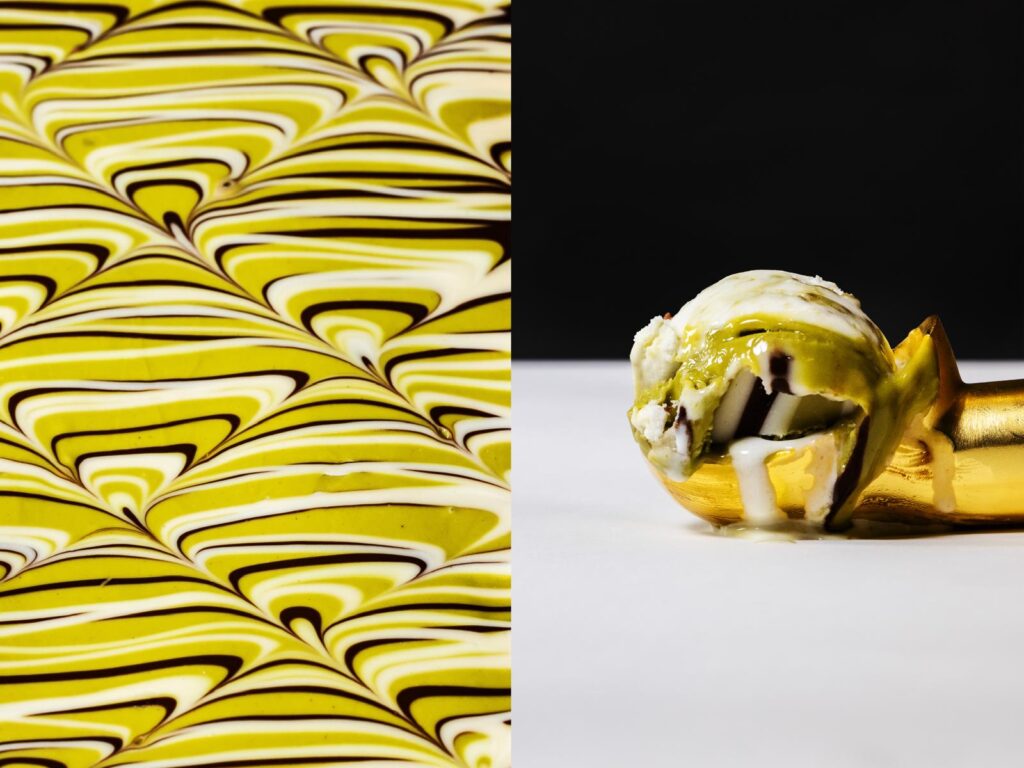 A banana on a table next to a wallpaper