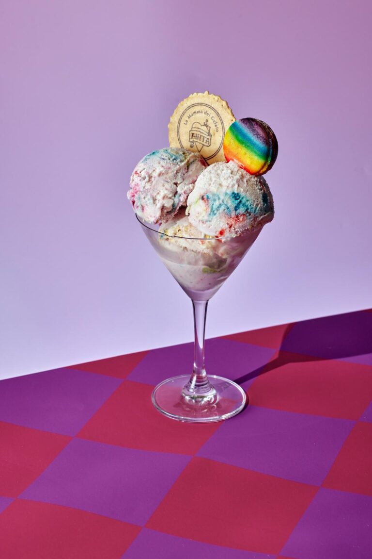 there is a dessert in a glass with a cookie on top
