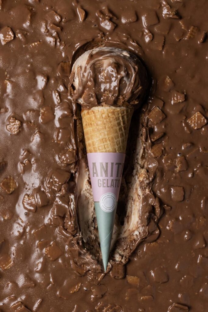 chocolate ice cream cone with a cone sticking out of it