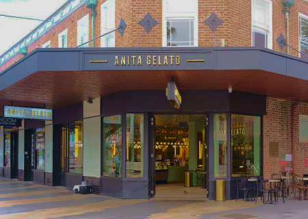 arafed building with a sign that says anta seltut on it
