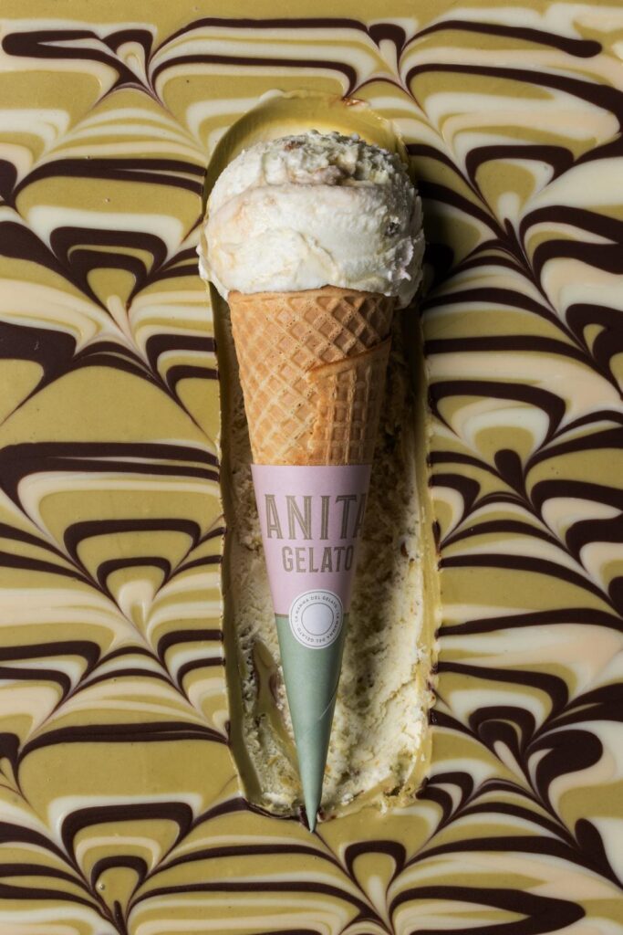 there is a ice cream cone with a cone sticking out of it