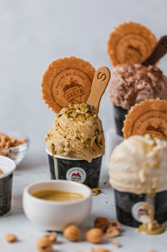 there are three cups of ice cream and two cups of cookies